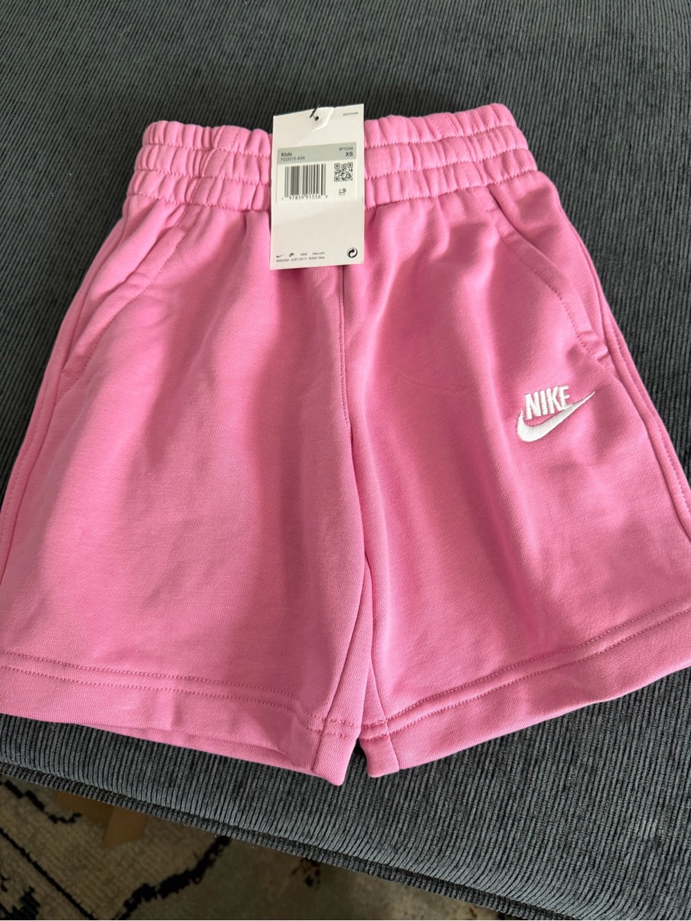 Nike Kids Pink Athletic Shorts with White Swoosh